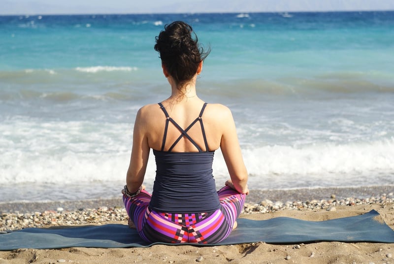 Woman meditating in a yoga pose